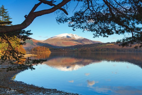 A beautiful photograph of snowy Blencathra reflected in Derwentwater as the light begins to fade. Please click on the picture for a bigger better view and to see options..