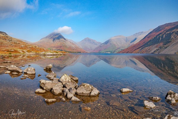 A truly beautiful and tranquil image of Wastwater on a summers'  eve. This is our deepest lake, and wasdale is home to our highest mountain, Scafell Pike, the flanks of which can be seen rising up to the right of the picture. Simply click on the picture to expand and explore.
