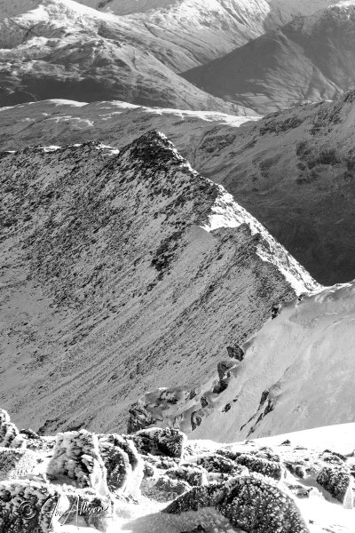 The magic of Striding Edge in winter is clearly seen here in this striking portrait image taken from higher up on Helvellyn. Try a quick click on the image to explore the bigger picture...