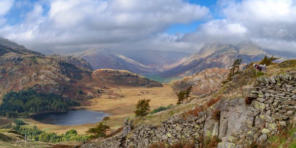 This must rank as one of my favourite photographs ever. Taken from the flanks of Lingmoor Fell, above the Blea Tarn side of Little Langdale, and looking straight across to Langdale valley with Bowfell and the Langdale Pikes shrouded in cloud. Awesome! Canon EOS 5d Mk11; Canon EF 24-105 L IS USM Lens, please click on the image to explore the size, media, and price options.